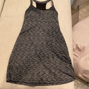 Athletic style dress, built in bra, mesh back. Quick dry fabric.